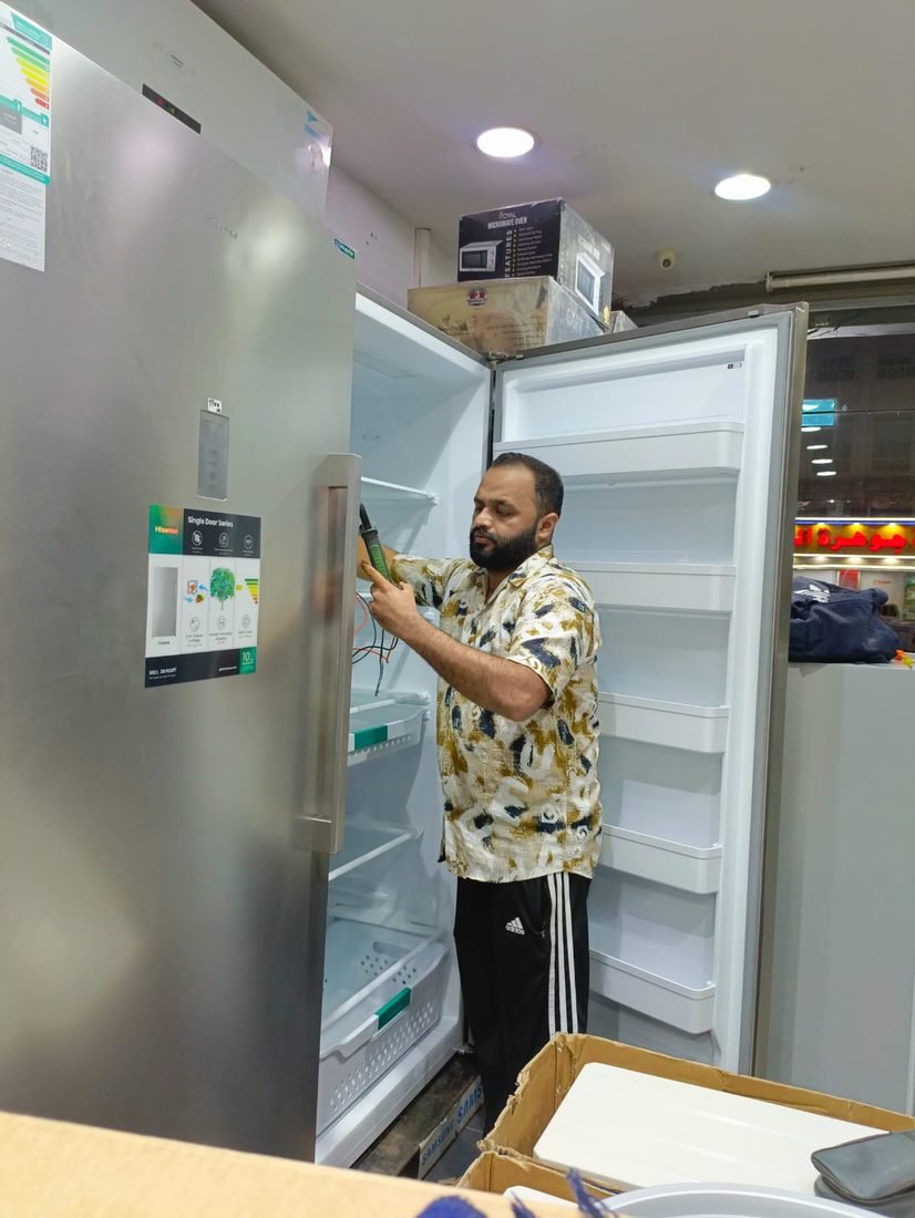 Repairing a fridge and measuring current draw in Jeddah